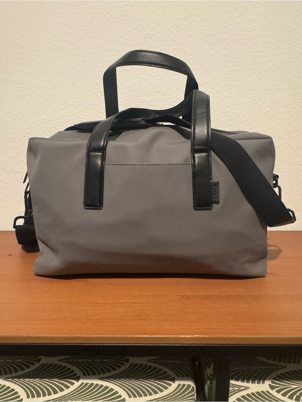 Away Gray Duffel Bag with Black Handles and Strap